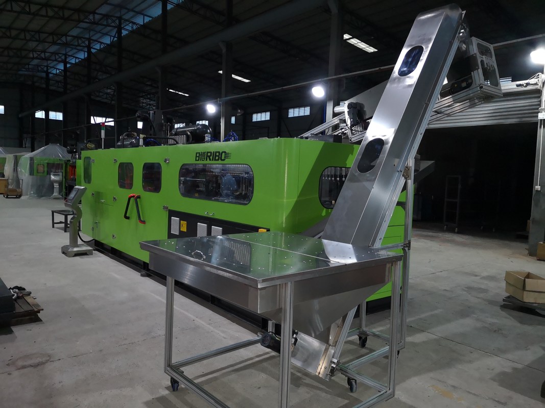 Milk Drink Pet Bottle Blow Molding Machine Multi Capacity With 105mm Cavity Pitch